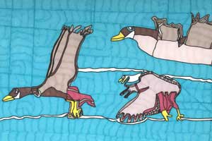 Artwork by Erik David Behnke of three birds flying